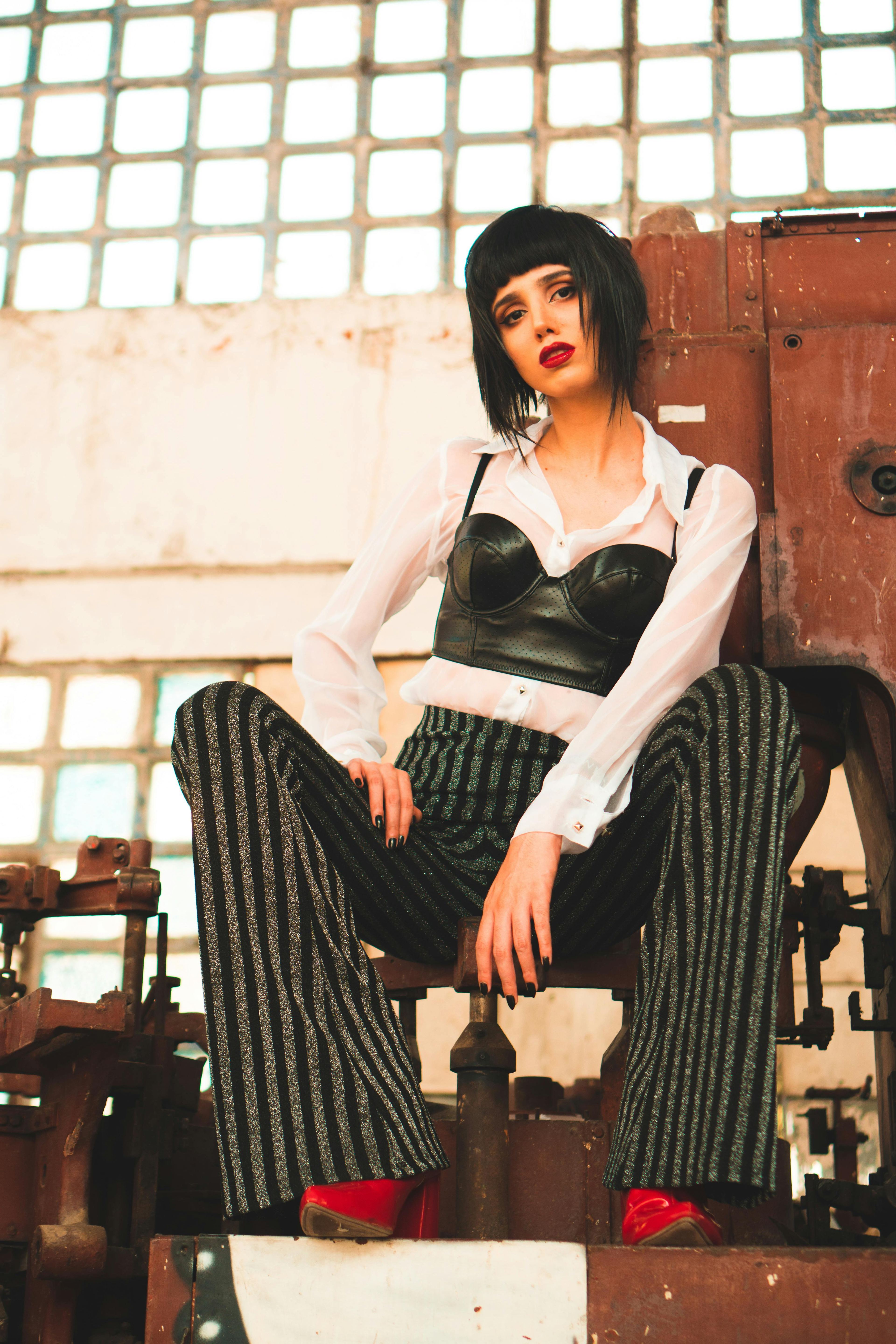 Steel silk dress on model in industrial setting