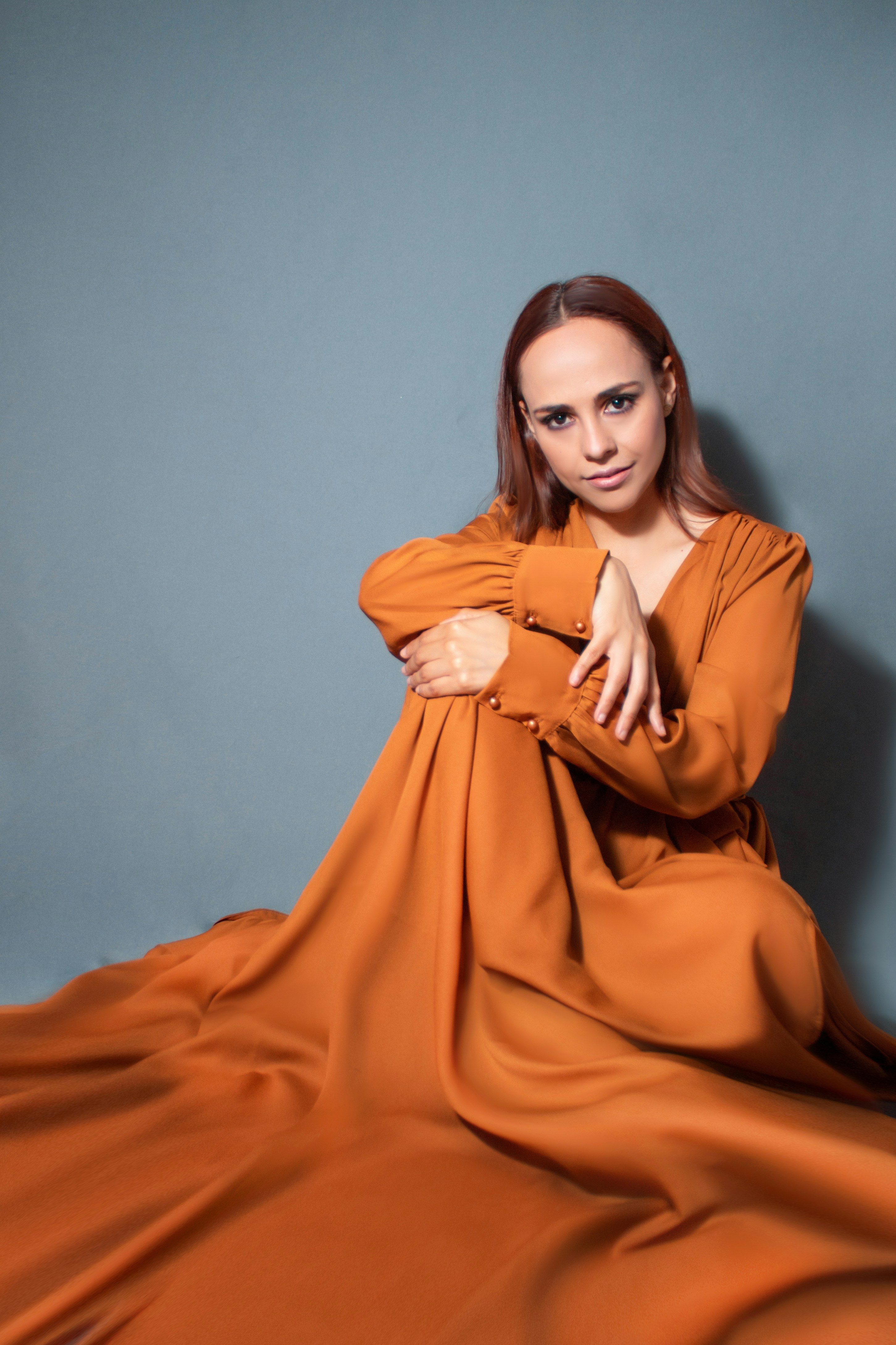 Antimony amber silk maxi dress on model, editorial neutral set